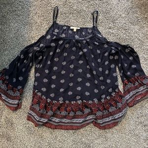 Patterned off the shoulder shirt